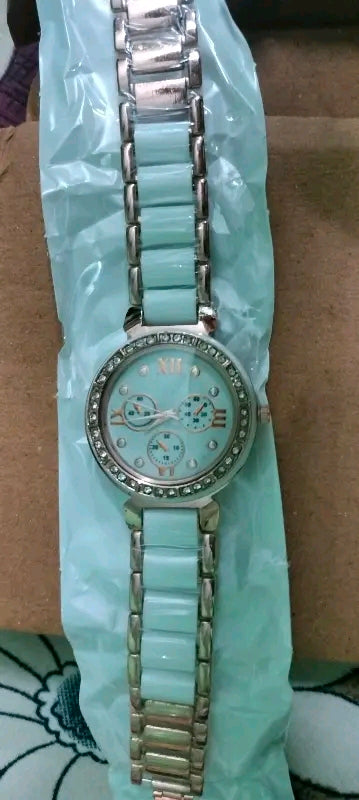 Analog Tatan with White mina round dial watch for womens or girls