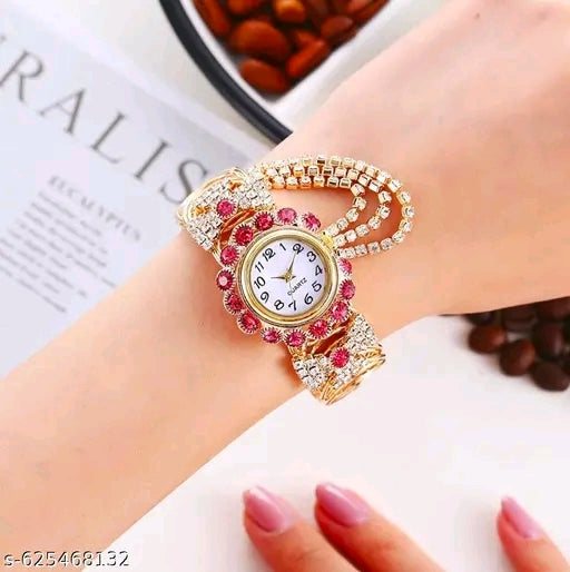 SK Enterprise Elegant gold-tone quartz bracelet watch adorned with sparkling red and white crystals