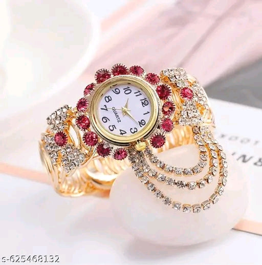 SK Enterprise Elegant gold-tone quartz bracelet watch adorned with sparkling red and white crystals