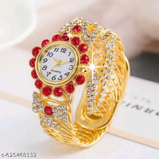 SK Enterprise Elegant gold-tone quartz bracelet watch adorned with sparkling red and white crystals
